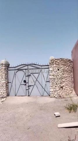 أرض بها فيلا نصف مصلوحة للبيع - 2