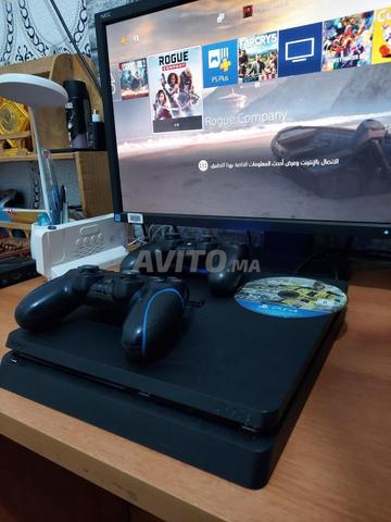 PS4 Slim 500Go 2 manettes et CD FIFA - 2