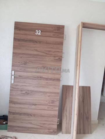 باب شقة بإطار وكسوة خارجية - 2