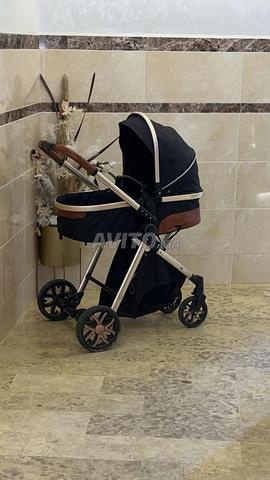 عربة أطفال جديدة