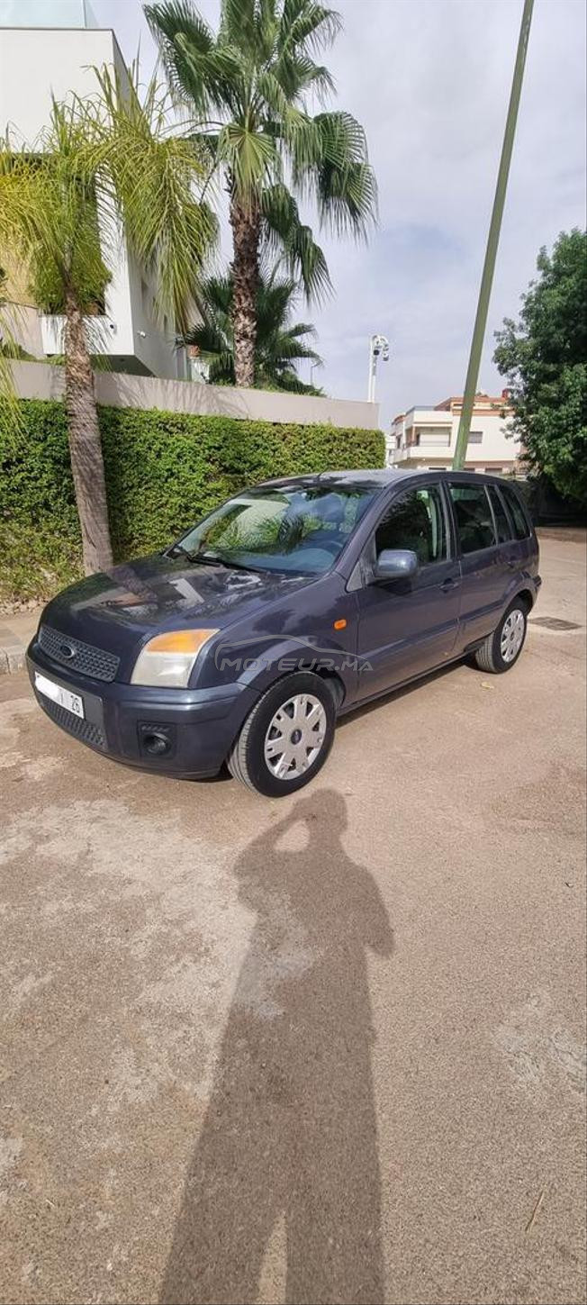 Ford fusion essence très bon état  