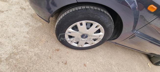 Ford fusion essence très bon état  