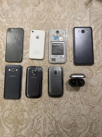 Lot de téléphone Samsung et I Phone et Oreillette - 2