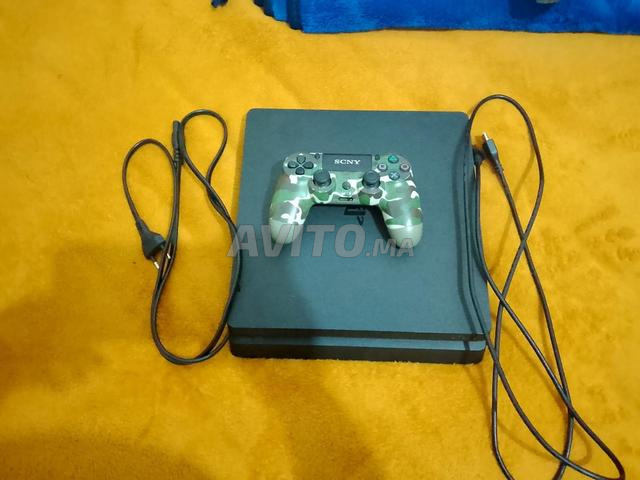 PS4 slim comme neuf - 2
