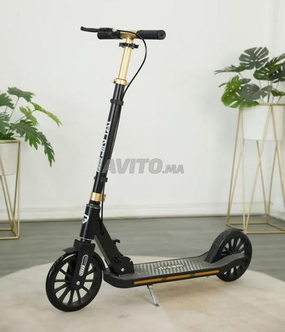 Trottinette métallique double frein pliable. - 2