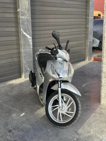 SH روبوت 125i - 2