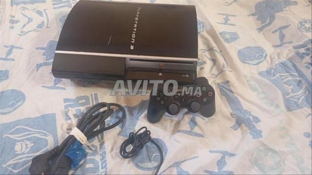 Encore propre, avec une manette originale et des jeux PES 21