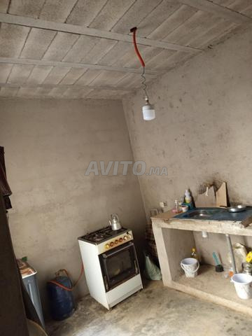 Appartement inférieur noir avec moitié de toit à vendre - 2