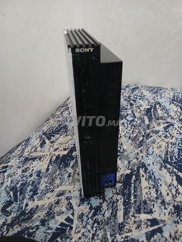 PlayStation 2, très bon état, 2 manettes, mémoire, 2 jeux, quartier Youssoufia, Rabat