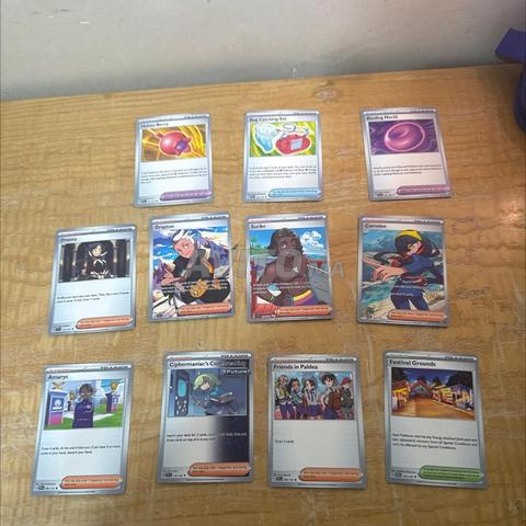 12 cartes Pokémon Trainer originales (prix négociable)