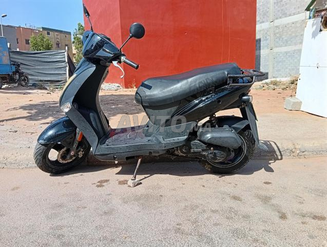 Kymco 4T à vendre