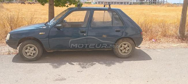 سيارة بيجو 205