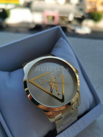 GUESS BADGE GW0782G1 GOLD ORIGINAL - 2