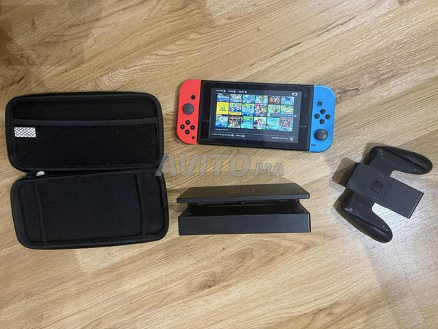 Nintendo Switch flashée, 37 jeux, accessoires.
