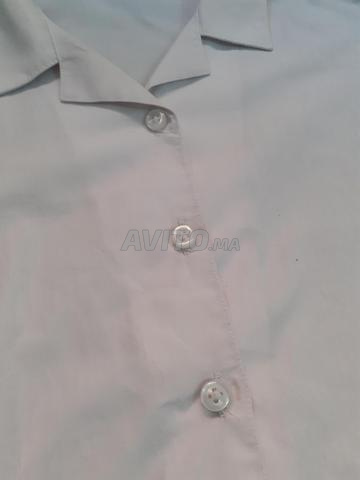 Chemise blanche enfant 9-10 ans bon état