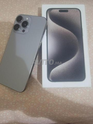 iPhone 15 Pro Max 256Go état batterie 91 gris