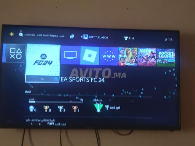 PS4 Fat en ligne 1 manette et FC 24 CD