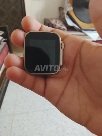 Montre cassée et chargeur USB neuf - 2