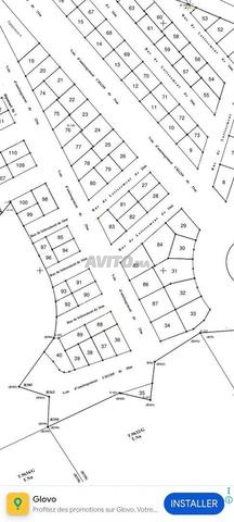 Terrain 393 m², garage 4, lotissement Hasnaoui, 14000 DH