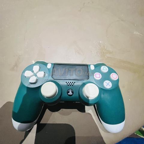PS4 Slim incluant une manette et deux jeux fc26/minekraft - 2