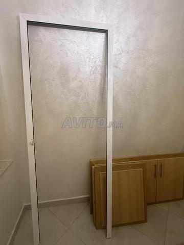 باب ألومنيوم أبيض بزجاج 75/210 - 2