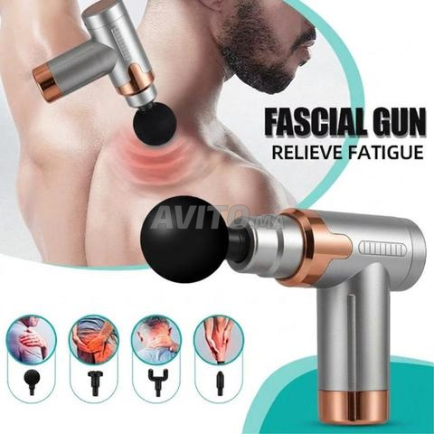 Pistolet de massage musculaire sans fil avec 4 têtes interchangeables - 2