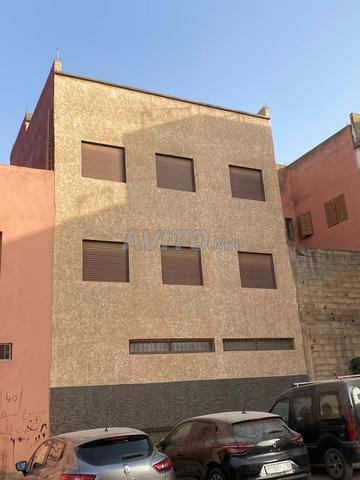 دار من طابقين وشرفة ومحل وقبو - 2