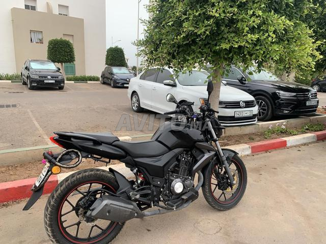 Qj موتو nx 150