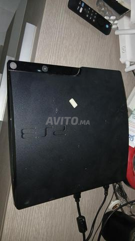 PS3 Slim avec manette et câbles