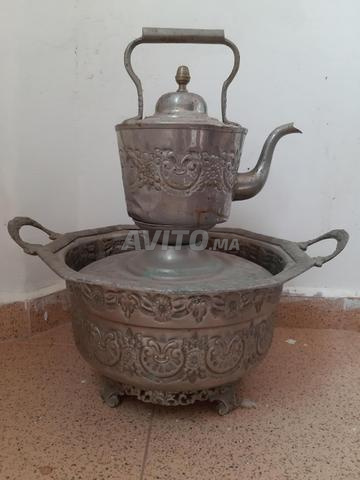 La tasse et son pichet en argent pur avec poinçon