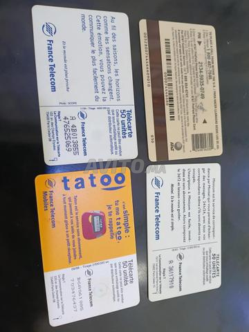 Quatre anciennes cartes téléphoniques - 2