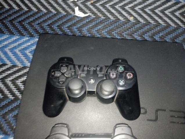 PS3 Slim plein de jeux avec deux manettes - 2