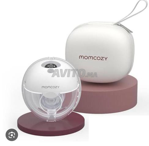 مضخة ثدي حرة اليدين Momcozy