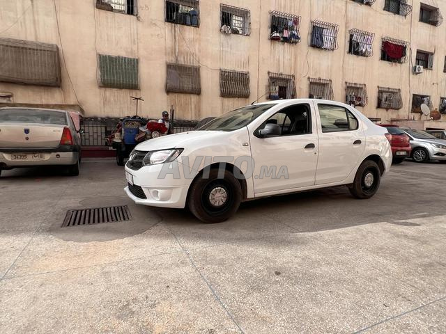 Dacia Logan entretien à la maison - 2