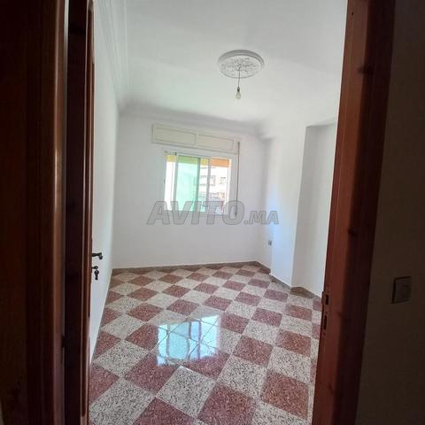 Appartement 4 pièces 102 m ascenseur syndic balcon sur rue