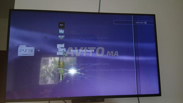 PS 3 super slim 500 Go et 4 Manettes - 2