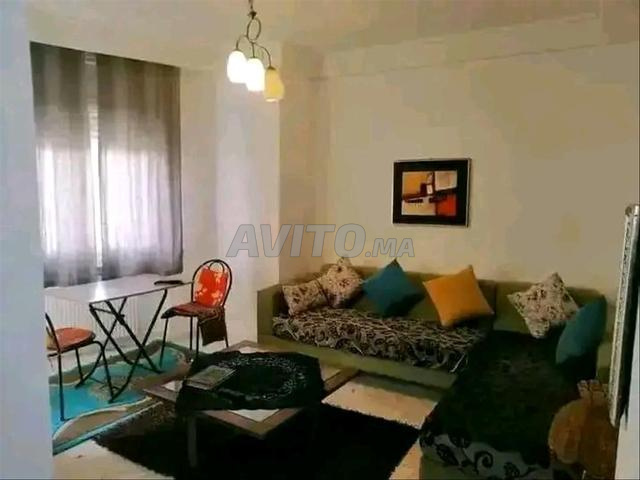 شقة مرتبة ونظيفة بحي راقٍ مع موقف سيارات - 2