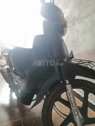 دراجة نارية دوكر C100 - 2