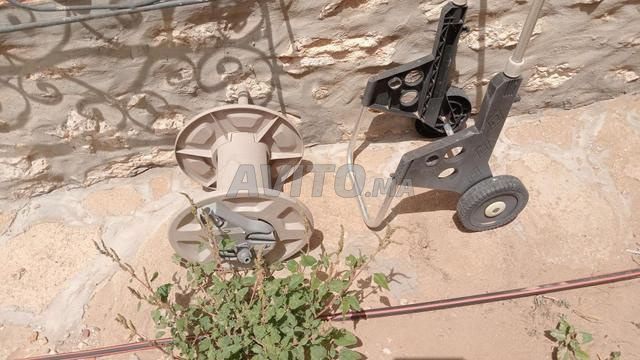 يبيع حوامل خراطيم، خراطيم، و بكرات خراطيم - 2