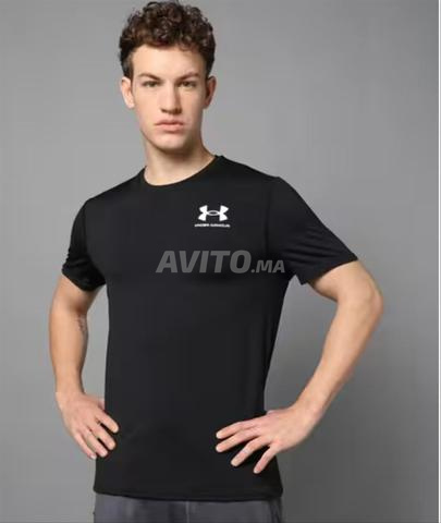 طقم UNDER ARMOUR مقاس L - 2