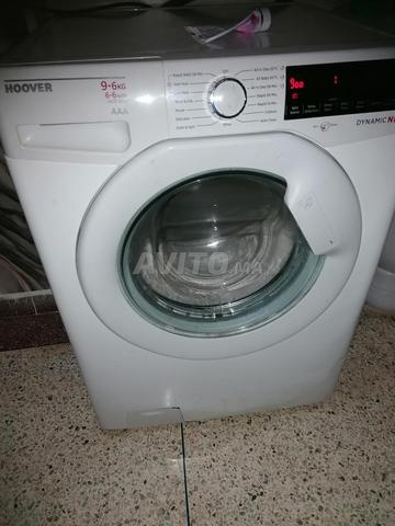آلة غسيل جميلة بها مجفف أيضاً، لا داعي لنشر الغسيل