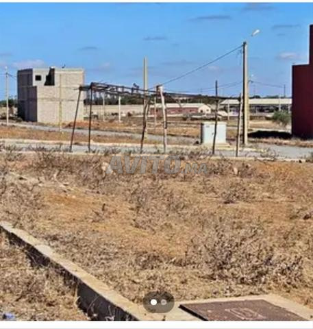 LOT DE TERRAIN 100 M² TITRE A VENDRE CHOKA R2.