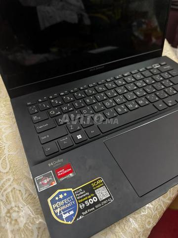 أسوس زين بوك 14 OLED - 2
