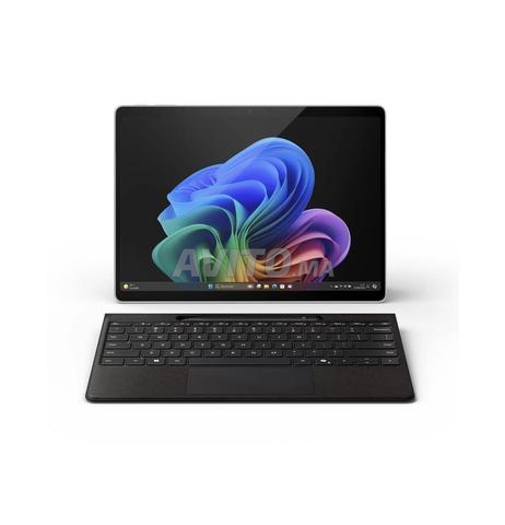 Surface Pro الإصدار 11 مع لوحة مفاتيح وقلم - 2