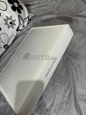 ماك بوك نيو 13 بوصة - شريحة Apple A18 Pro / 512 جيجابايت SSD