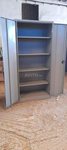 Armoire métallique haute porte battante / en stock