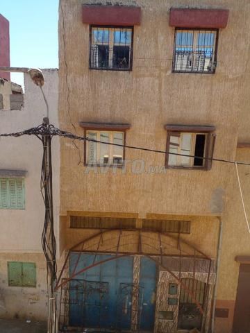 منزل من طابقين مع محل تجاري وسطح للبيع - 2