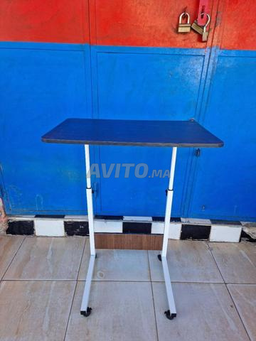 Table polyvalente réglable en hauteur. - 2