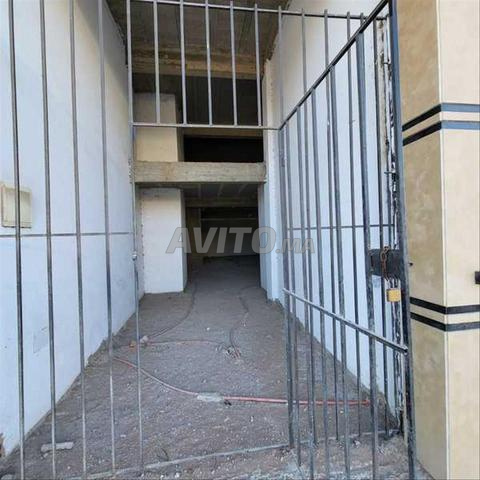 93698-بيع محل تجاري ببوسكورة بالمنطقة الصناعية Cfci - 2