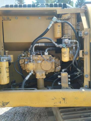 Pelle CAT 320 D Modèle 2010 - 2